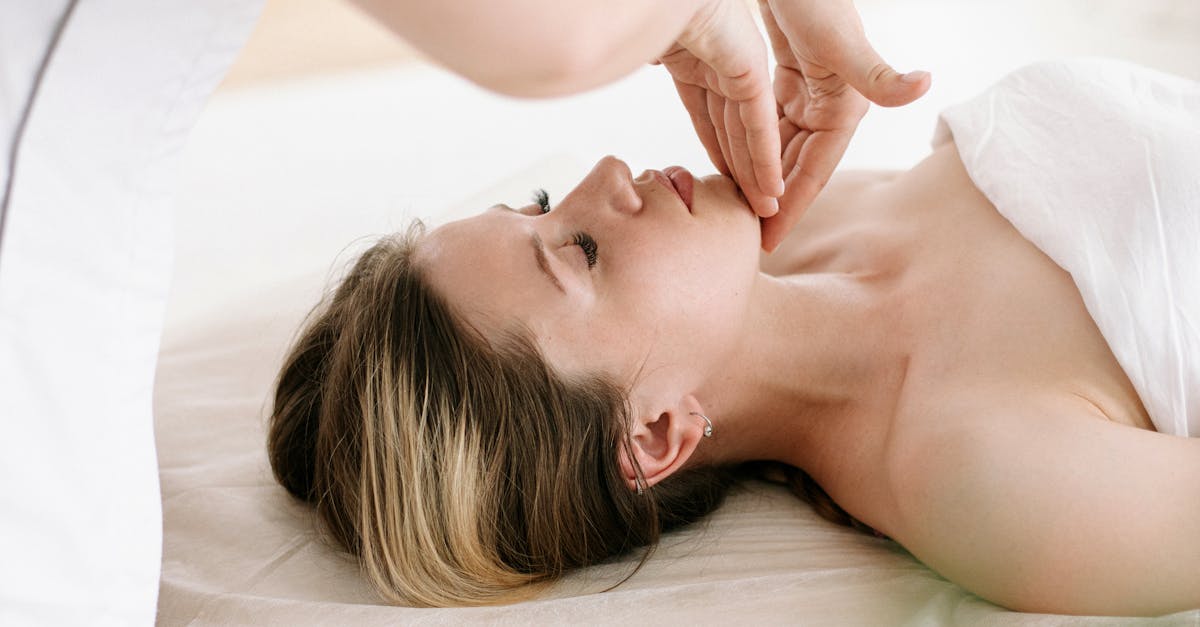 What notable differences exist between a Registered Massage Therapist (RMT) and a general massage therapist in terms of training and services offered?