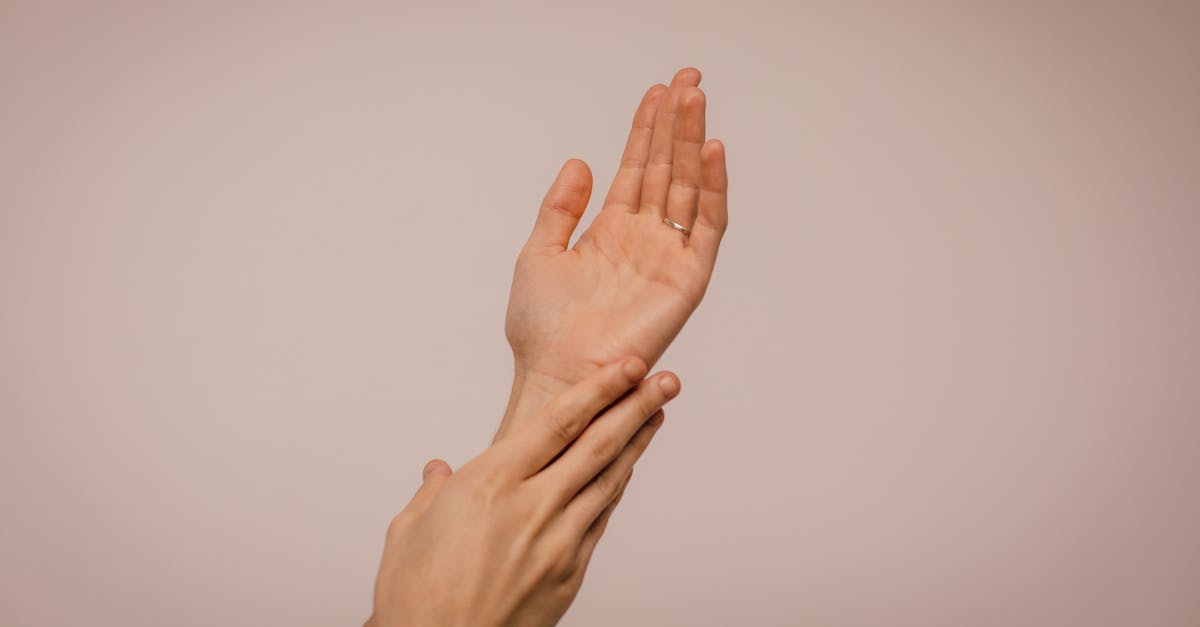 What should you expect regarding attire when booking a Thai massage for the first time?