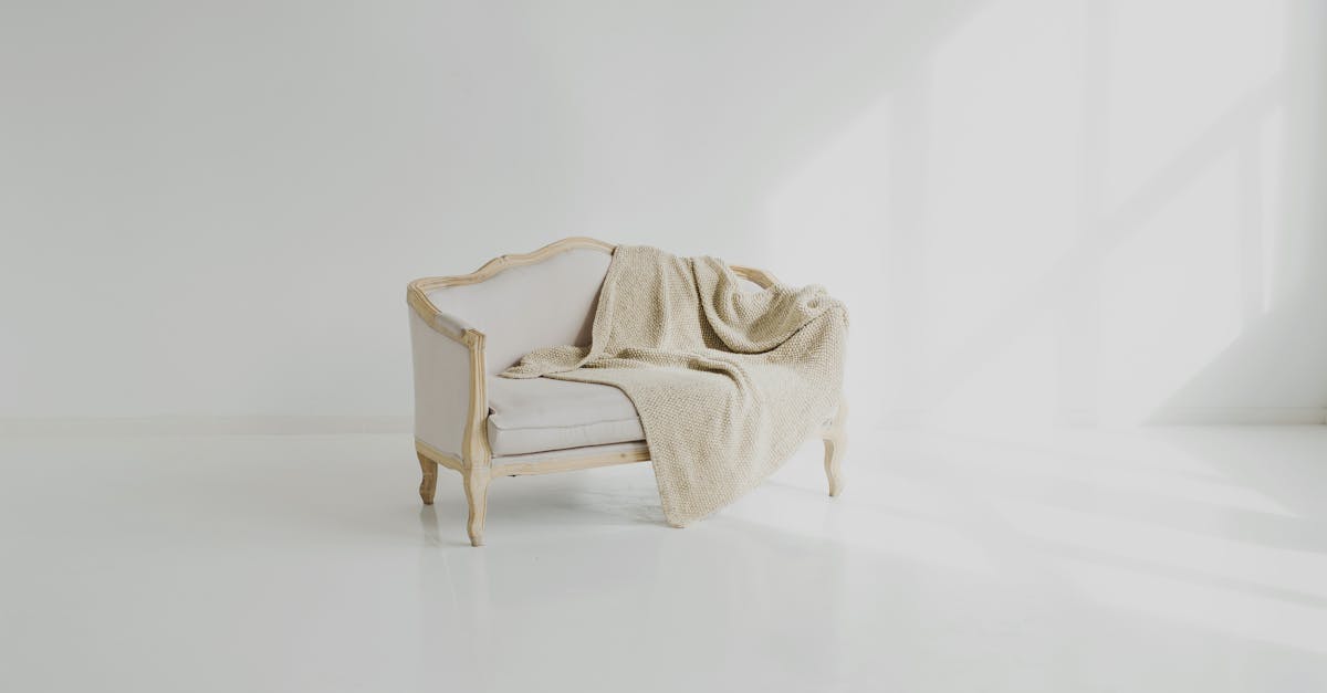 What is the best way to clean fabric upholstery?